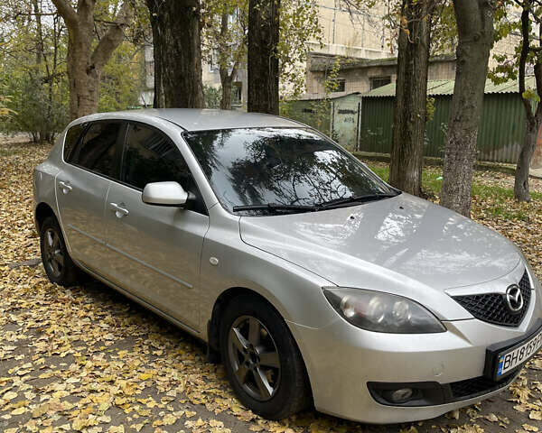 Серый Мазда 3, объемом двигателя 1.56 л и пробегом 336 тыс. км за 5600 $, фото 1 на Automoto.ua