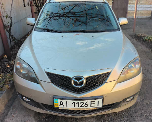 Серый Мазда 3, объемом двигателя 1.6 л и пробегом 185 тыс. км за 3000 $, фото 1 на Automoto.ua