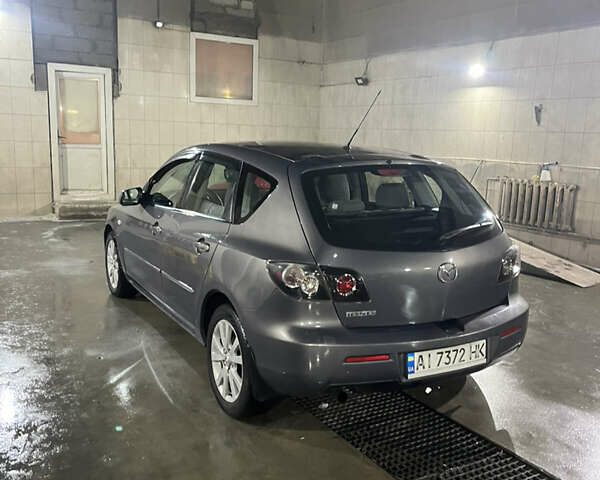 Серый Мазда 3, объемом двигателя 1.6 л и пробегом 249 тыс. км за 3900 $, фото 1 на Automoto.ua