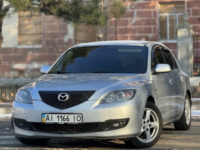 Сірий Мазда 3, об'ємом двигуна 1.6 л та пробігом 306 тис. км за 4999 $, фото 1 на Automoto.ua