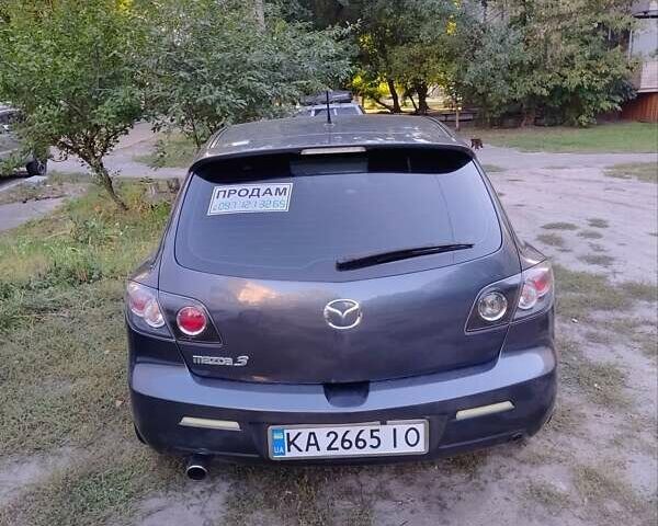 Серый Мазда 3, объемом двигателя 1.6 л и пробегом 193 тыс. км за 6000 $, фото 1 на Automoto.ua