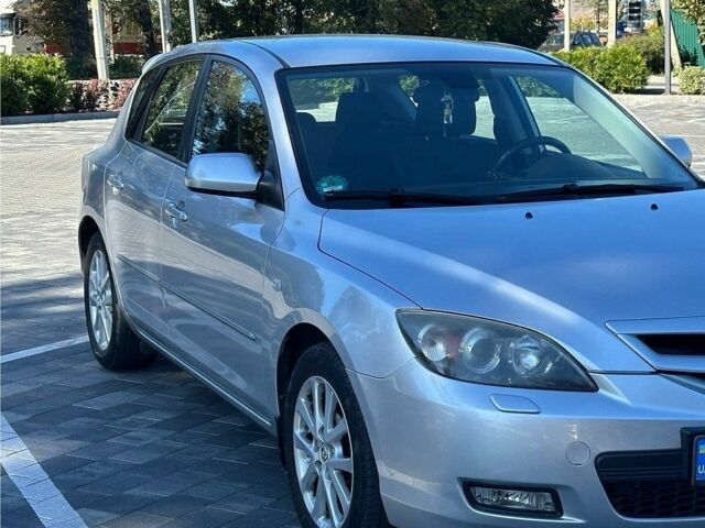 Серый Мазда 3, объемом двигателя 1.6 л и пробегом 215 тыс. км за 5900 $, фото 1 на Automoto.ua