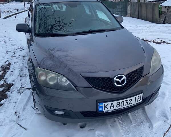 Серый Мазда 3, объемом двигателя 1.6 л и пробегом 184 тыс. км за 5500 $, фото 1 на Automoto.ua
