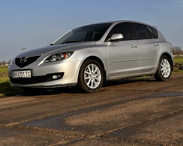 Серый Мазда 3, объемом двигателя 1.6 л и пробегом 160 тыс. км за 6000 $, фото 1 на Automoto.ua