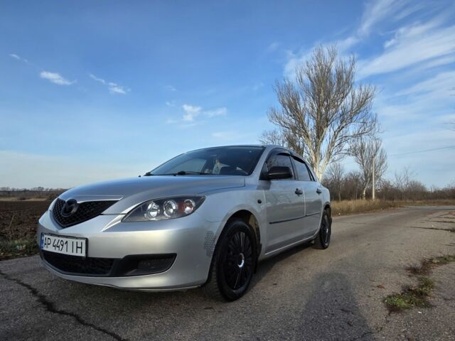 Серый Мазда 3, объемом двигателя 1.3 л и пробегом 197 тыс. км за 4600 $, фото 1 на Automoto.ua