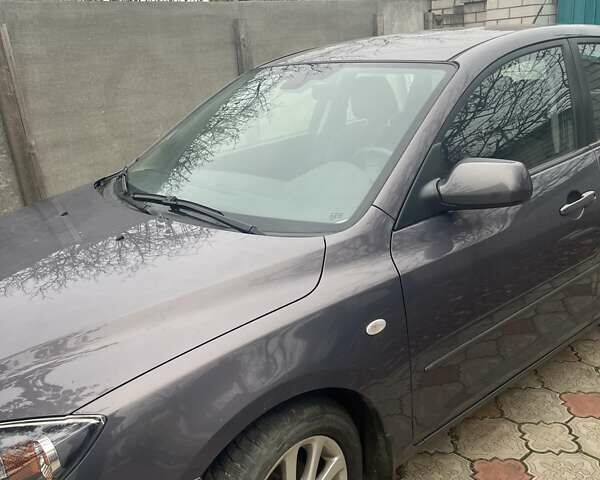 Серый Мазда 3, объемом двигателя 1.6 л и пробегом 66 тыс. км за 6500 $, фото 1 на Automoto.ua