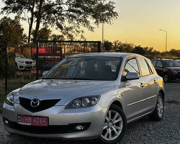 Серый Мазда 3, объемом двигателя 1.6 л и пробегом 206 тыс. км за 7400 $, фото 1 на Automoto.ua
