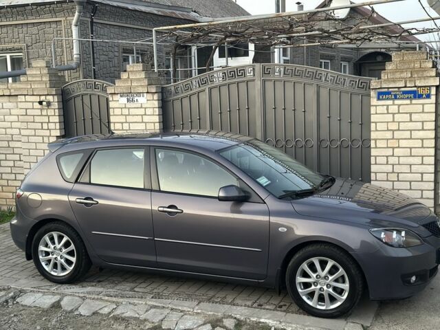 Серый Мазда 3, объемом двигателя 1.6 л и пробегом 59 тыс. км за 7000 $, фото 1 на Automoto.ua