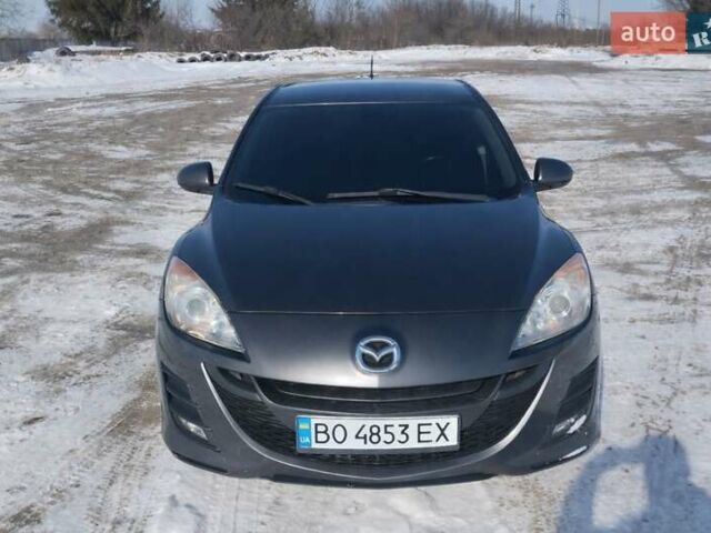 Серый Мазда 3, объемом двигателя 1.56 л и пробегом 260 тыс. км за 7100 $, фото 1 на Automoto.ua