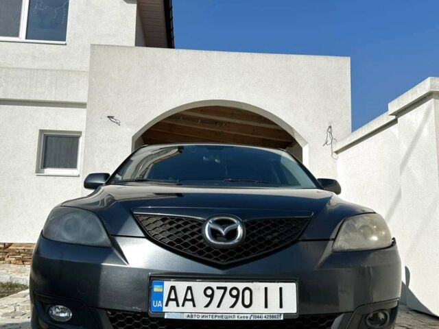 Серый Мазда 3, объемом двигателя 1.6 л и пробегом 202 тыс. км за 5600 $, фото 1 на Automoto.ua