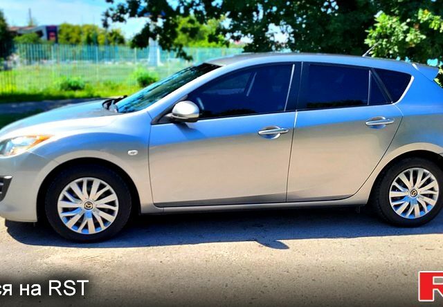 Серый Мазда 3, объемом двигателя 1.6 л и пробегом 180 тыс. км за 6600 $, фото 1 на Automoto.ua