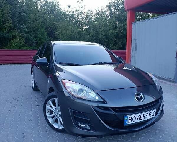 Серый Мазда 3, объемом двигателя 1.56 л и пробегом 250 тыс. км за 7600 $, фото 1 на Automoto.ua