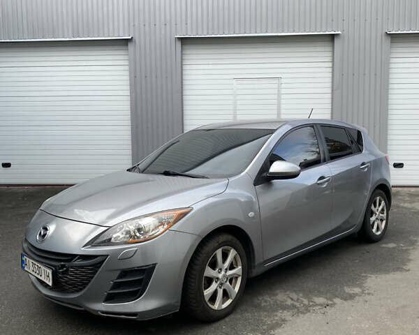 Серый Мазда 3, объемом двигателя 1.56 л и пробегом 240 тыс. км за 4700 $, фото 1 на Automoto.ua