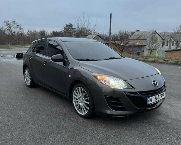 Сірий Мазда 3, об'ємом двигуна 1.6 л та пробігом 195 тис. км за 6900 $, фото 1 на Automoto.ua