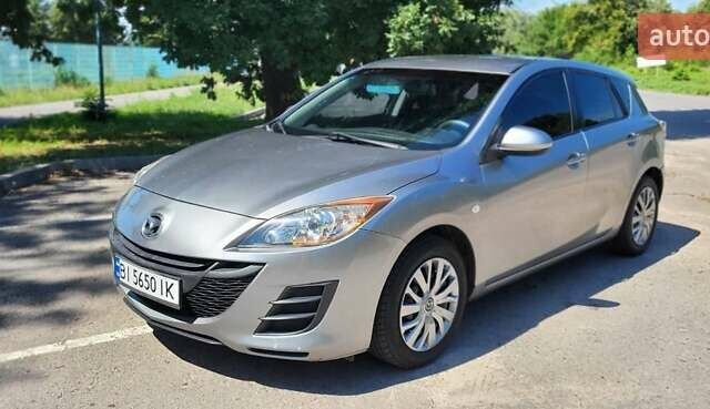 Серый Мазда 3, объемом двигателя 1.6 л и пробегом 180 тыс. км за 6900 $, фото 1 на Automoto.ua
