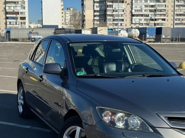 Серый Мазда 3, объемом двигателя 2 л и пробегом 300 тыс. км за 4900 $, фото 1 на Automoto.ua