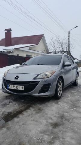 Серый Мазда 3, объемом двигателя 1.6 л и пробегом 245 тыс. км за 6300 $, фото 1 на Automoto.ua