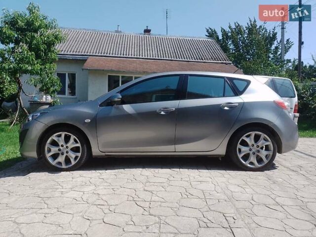 Серый Мазда 3, объемом двигателя 1.56 л и пробегом 230 тыс. км за 9500 $, фото 1 на Automoto.ua