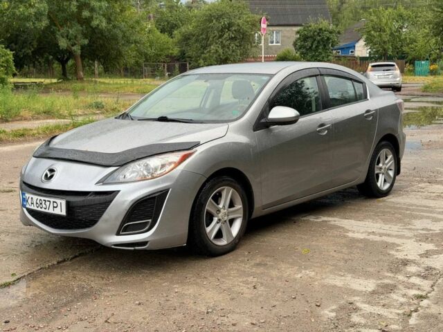 Серый Мазда 3, объемом двигателя 2 л и пробегом 234 тыс. км за 6300 $, фото 1 на Automoto.ua