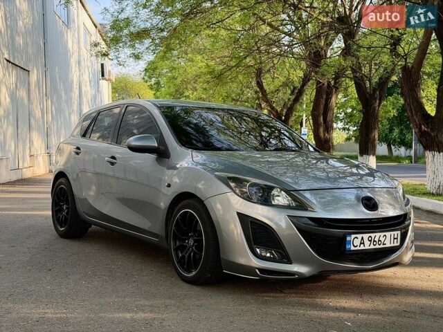Сірий Мазда 3, об'ємом двигуна 2.2 л та пробігом 220 тис. км за 6499 $, фото 1 на Automoto.ua
