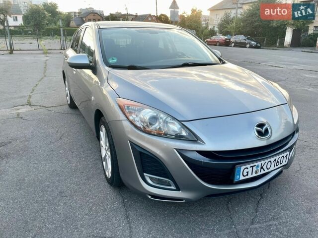 Серый Мазда 3, объемом двигателя 1.6 л и пробегом 185 тыс. км за 6750 $, фото 1 на Automoto.ua