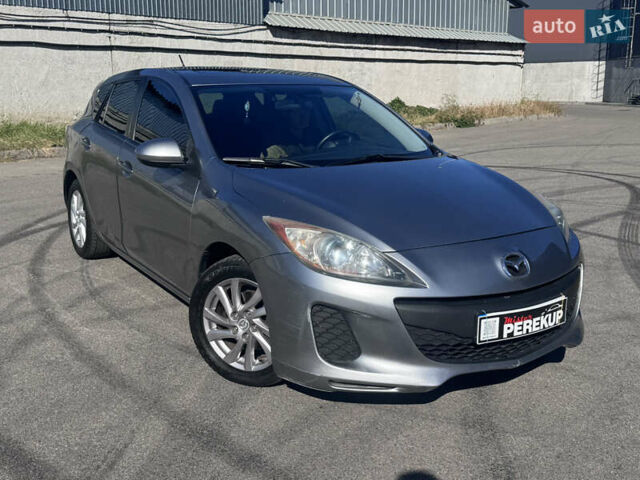 Серый Мазда 3, объемом двигателя 2 л и пробегом 190 тыс. км за 7999 $, фото 1 на Automoto.ua