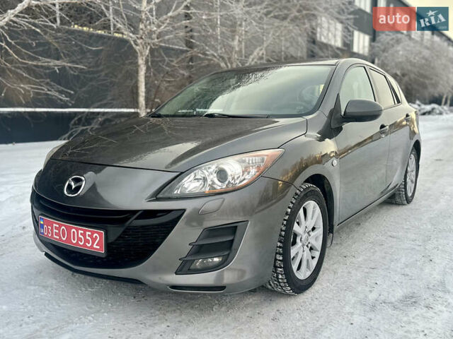 Серый Мазда 3, объемом двигателя 2 л и пробегом 187 тыс. км за 7999 $, фото 1 на Automoto.ua