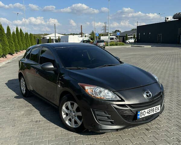 Серый Мазда 3, объемом двигателя 1.6 л и пробегом 176 тыс. км за 7300 $, фото 1 на Automoto.ua