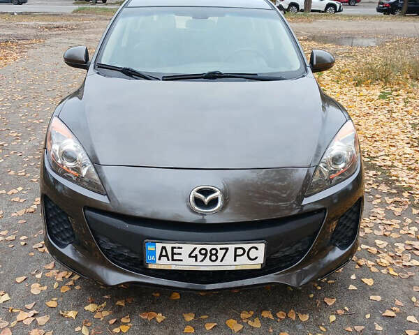 Серый Мазда 3, объемом двигателя 2 л и пробегом 195 тыс. км за 7200 $, фото 1 на Automoto.ua