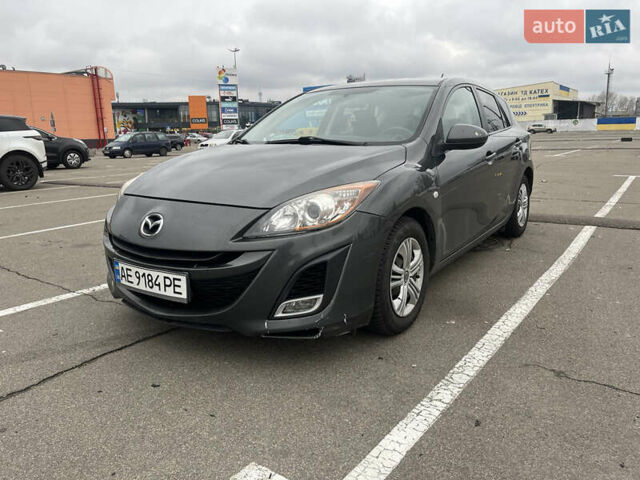 Серый Мазда 3, объемом двигателя 1.6 л и пробегом 255 тыс. км за 6600 $, фото 1 на Automoto.ua