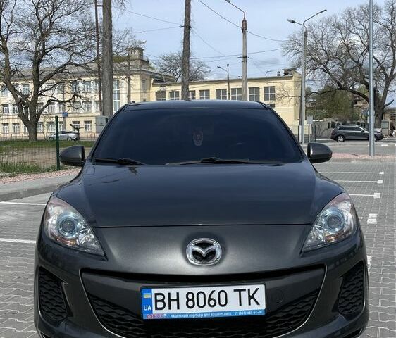 Сірий Мазда 3, об'ємом двигуна 2 л та пробігом 190 тис. км за 9900 $, фото 1 на Automoto.ua