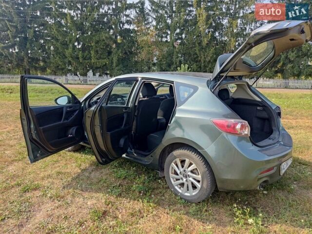 Серый Мазда 3, объемом двигателя 2 л и пробегом 210 тыс. км за 5000 $, фото 1 на Automoto.ua