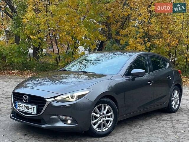 Серый Мазда 3, объемом двигателя 1.5 л и пробегом 39 тыс. км за 13790 $, фото 1 на Automoto.ua