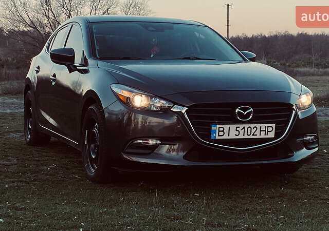 Серый Мазда 3, объемом двигателя 2.5 л и пробегом 171 тыс. км за 13000 $, фото 1 на Automoto.ua