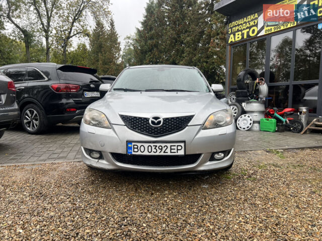 Серый Мазда 3, объемом двигателя 2 л и пробегом 242 тыс. км за 3400 $, фото 1 на Automoto.ua