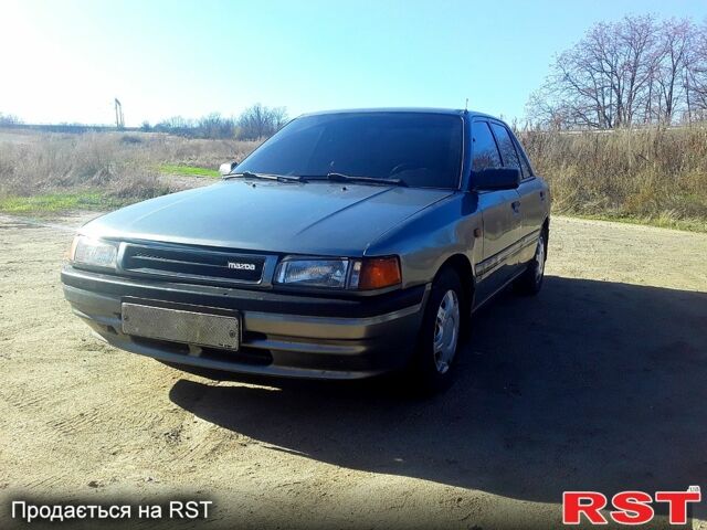 Серый Мазда 3, объемом двигателя 1.6 л и пробегом 205 тыс. км за 1500 $, фото 1 на Automoto.ua