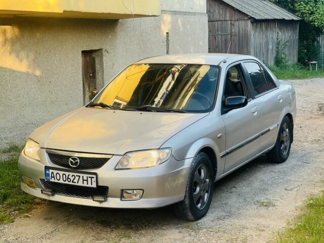 Серый Мазда 3, объемом двигателя 1.6 л и пробегом 230 тыс. км за 1600 $, фото 1 на Automoto.ua
