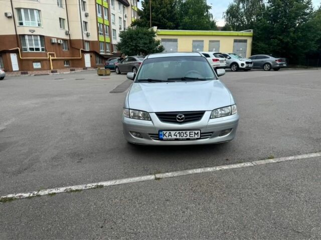 Сірий Мазда 3, об'ємом двигуна 2 л та пробігом 360 тис. км за 2803 $, фото 1 на Automoto.ua