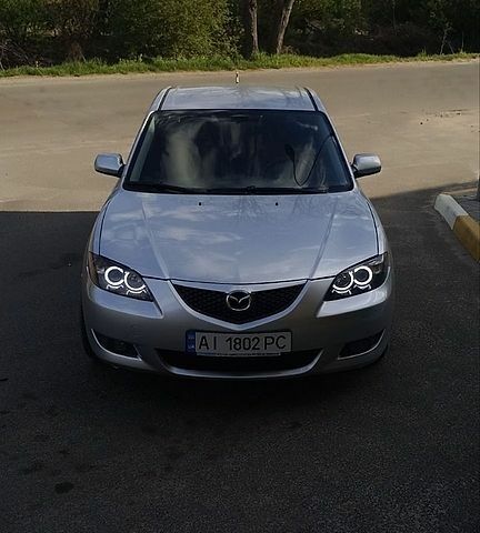 Сірий Мазда 3, об'ємом двигуна 2 л та пробігом 345 тис. км за 3950 $, фото 1 на Automoto.ua