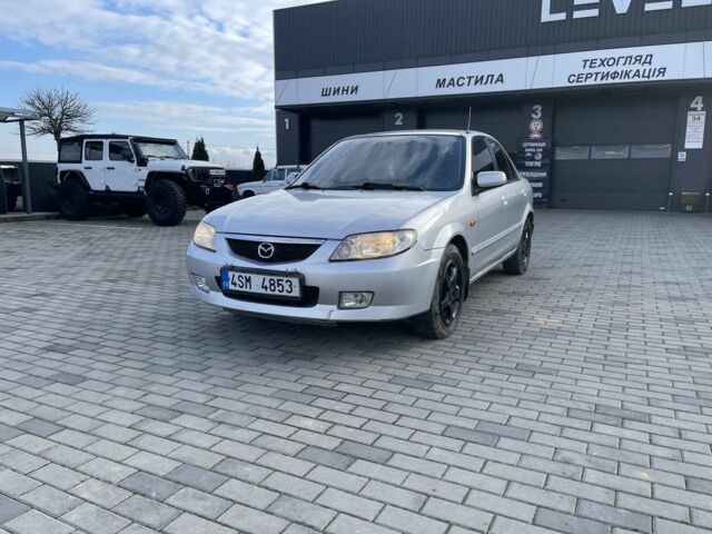 Сірий Мазда 3, об'ємом двигуна 2 л та пробігом 237 тис. км за 1000 $, фото 1 на Automoto.ua