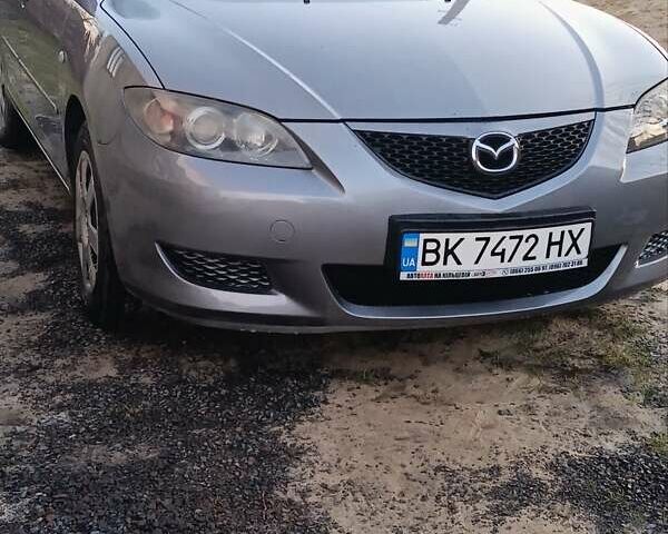 Серый Мазда 3, объемом двигателя 1.6 л и пробегом 278 тыс. км за 3200 $, фото 1 на Automoto.ua