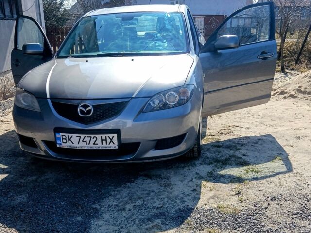 Серый Мазда 3, объемом двигателя 1.6 л и пробегом 278 тыс. км за 3900 $, фото 1 на Automoto.ua