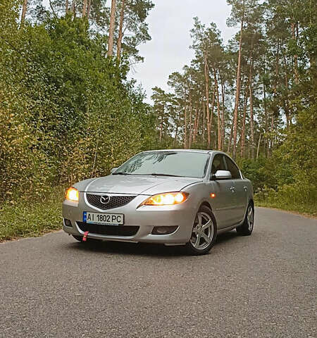 Серый Мазда 3, объемом двигателя 2 л и пробегом 345 тыс. км за 4150 $, фото 1 на Automoto.ua