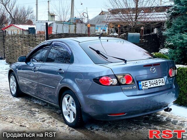 Серый Мазда 3, объемом двигателя 2 л и пробегом 170 тыс. км за 5000 $, фото 1 на Automoto.ua