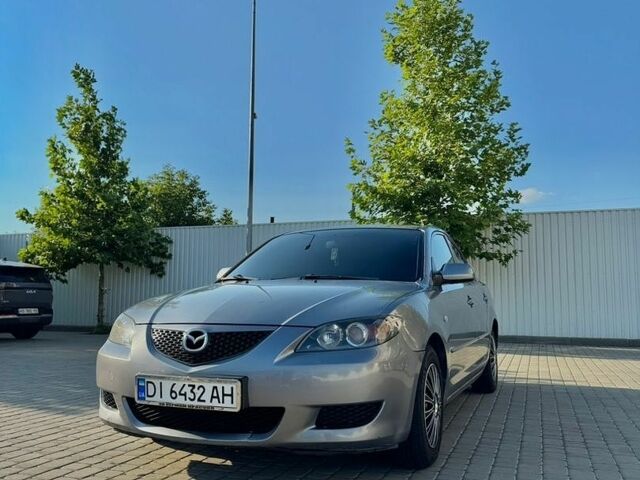 Сірий Мазда 3, об'ємом двигуна 1.6 л та пробігом 315 тис. км за 4499 $, фото 1 на Automoto.ua