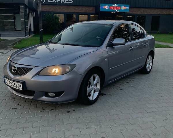 Серый Мазда 3, объемом двигателя 1.6 л и пробегом 137 тыс. км за 3600 $, фото 1 на Automoto.ua