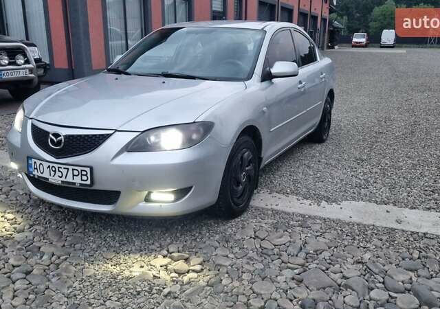 Серый Мазда 3, объемом двигателя 1.56 л и пробегом 352 тыс. км за 2800 $, фото 1 на Automoto.ua