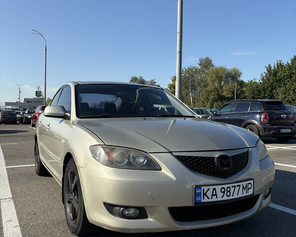 Серый Мазда 3, объемом двигателя 1.6 л и пробегом 370 тыс. км за 4000 $, фото 1 на Automoto.ua