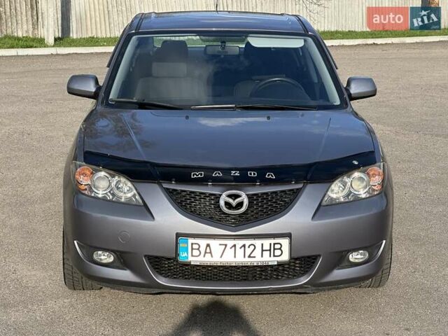 Серый Мазда 3, объемом двигателя 1.6 л и пробегом 180 тыс. км за 5599 $, фото 1 на Automoto.ua