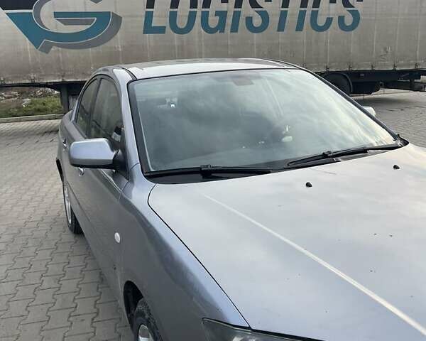 Серый Мазда 3, объемом двигателя 1.6 л и пробегом 360 тыс. км за 3000 $, фото 1 на Automoto.ua